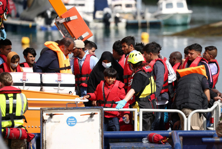 Migrants arrive at Dover harbour after being rescued while attempting to cross the English Channel