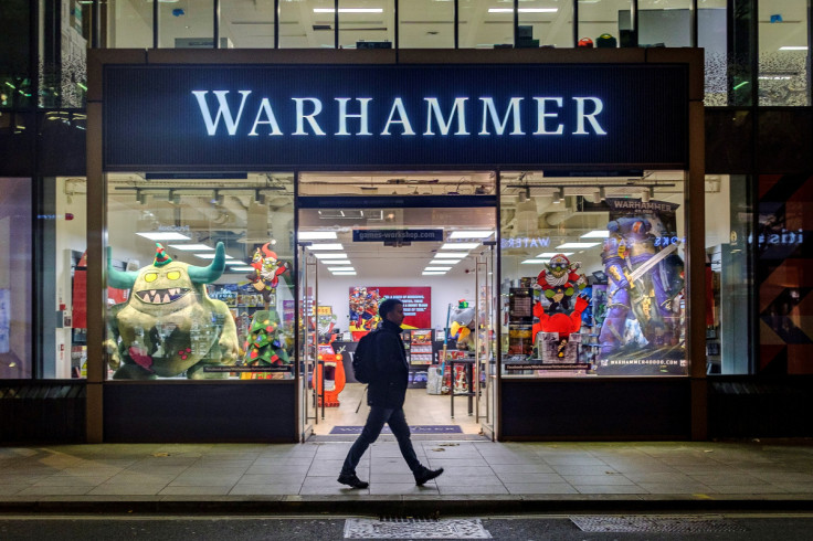 A person walks past a Warhammer store, a brand owned by Games Workshop, in London