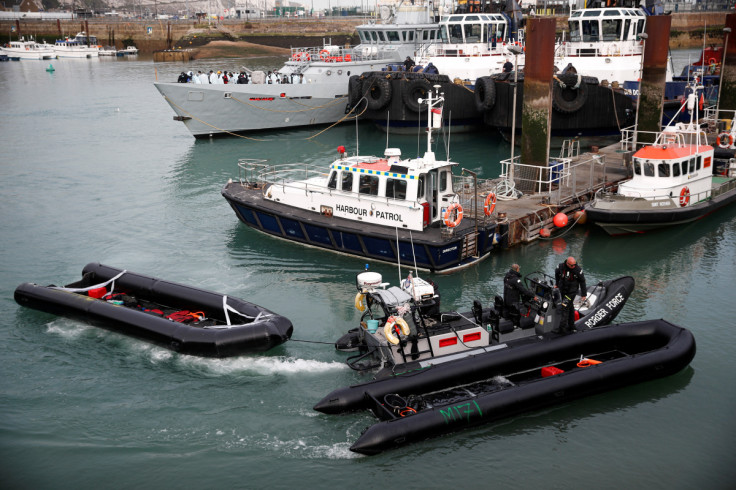 Migrants arrive in Dover after being rescued while crossing the English Channel