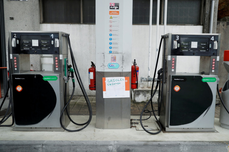 A placard reading "Diesel sold out" is seen at a gas station in Porto