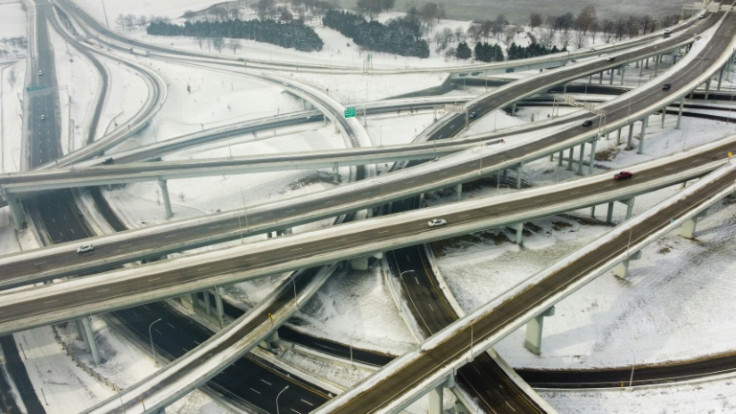 Drivers make their way along a snowy highway in Louisville, Kentucky, which was hit by freezing temperatures on December 23, 2022