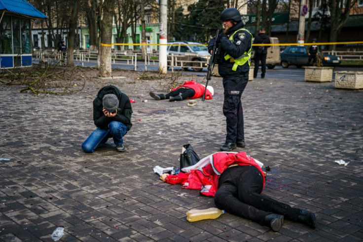 A deadly shelling on a busy market in Kherson's centre left 10 people dead and 55 injured