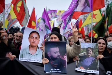 Supporters and members of the Kurdish community rallied in Paris on Saturday after three people were killed in an attack