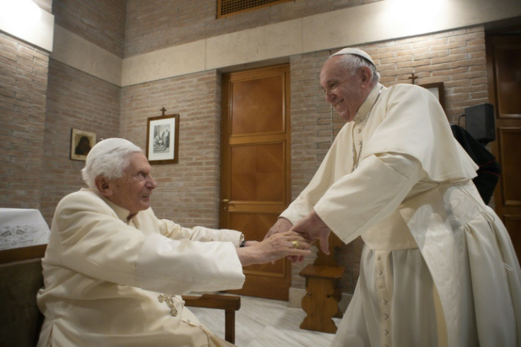 Pope Francis (R) sparked alarm on Wednesday by revealing at his general audience that his predecessor, former pope Benedict (L), was "very ill"