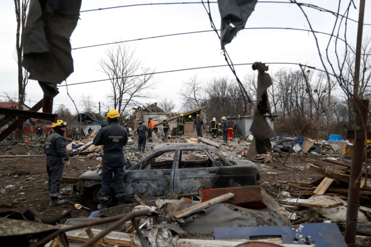 Rescuers work at a site damaged during a Russian missile strike, in Kyiv