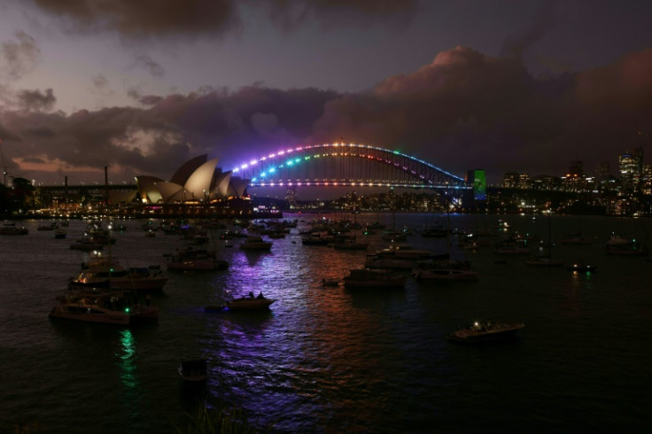 Boats gather on the harbour for New Year's Eve celebrations in Sydney
