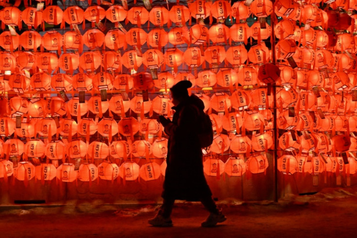 Buddhists offered prayers in front of lotus lanterns at Jogye temple in Seoul, South Korea