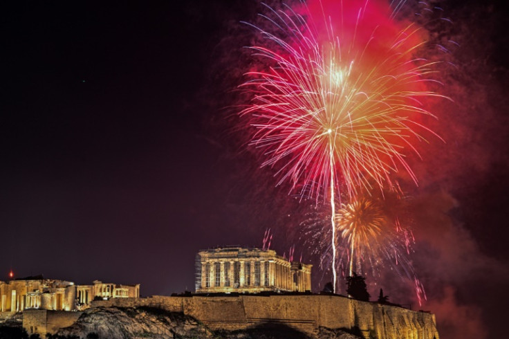 Fireworks explode over the Acropolis during New Year celebrations in Athens, early on January 1, 2023
