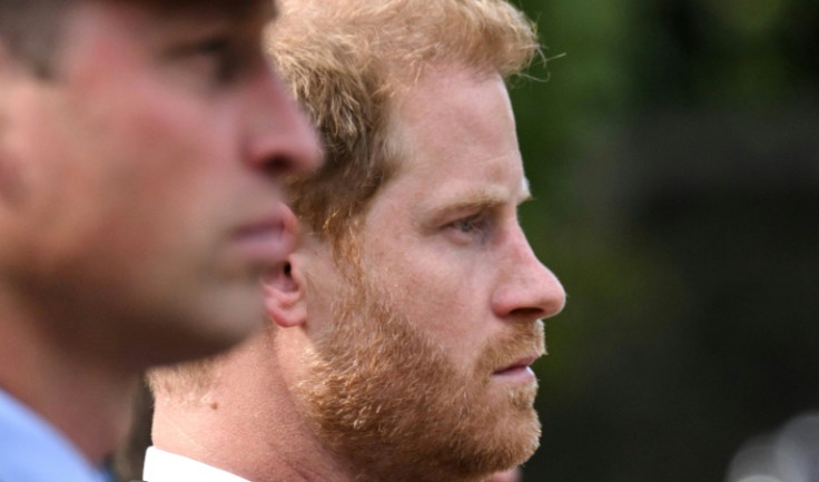 The feud between brothers Britain's Princes William (L) and Harry continues in the run-up to their father King Charles' coronation in May 2023