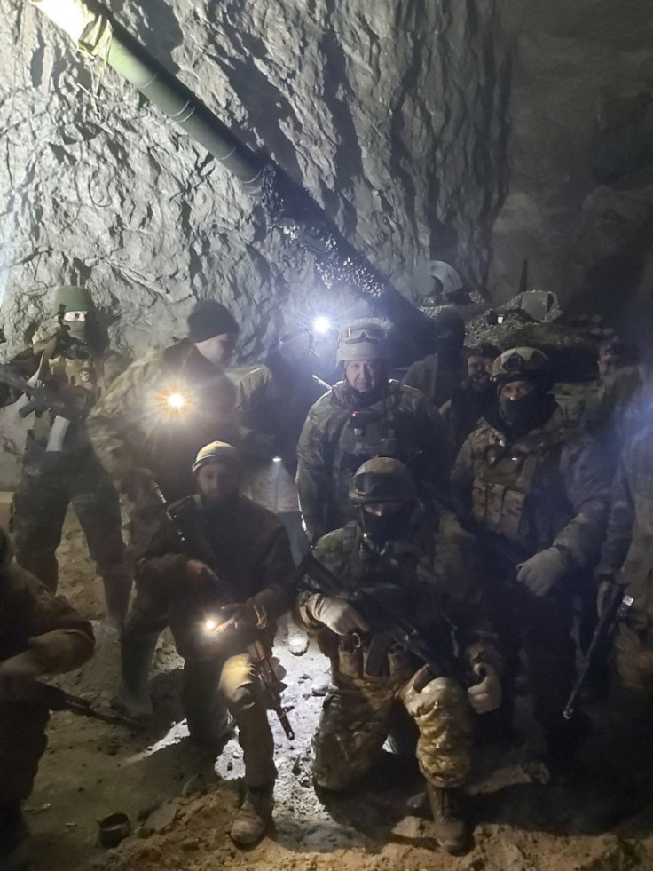 People in military uniform, claimed to be soldiers of Russian mercenary group Wagner pose for a picture believed to be in a salt mine in Soledar