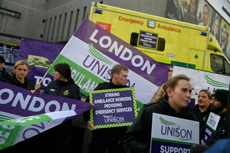 Ambulance workers take part in a strike in London