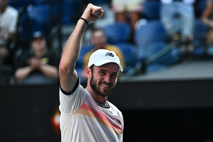 Tommy Paul celebrates after beating Ben Shelton