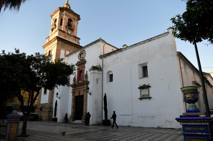 The mayor of Algeciras has declared a day of mourning following the attacks, which killed a verger and badly injured a priest.