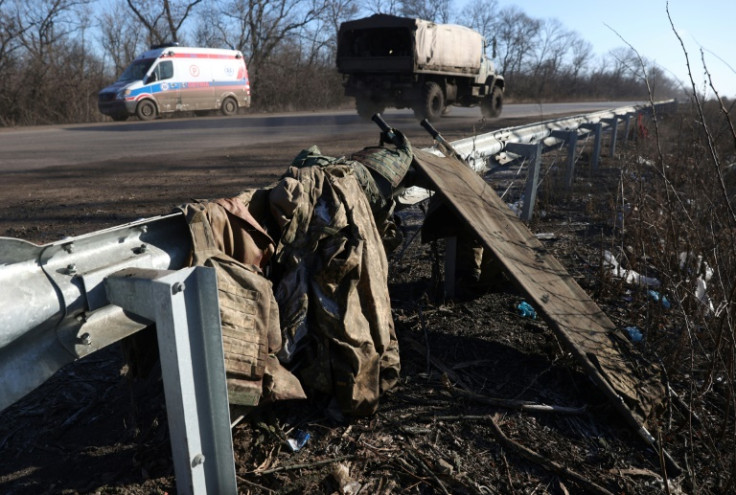 A stretcher and discarded Ukrainian military equipment on a roadside not far from Bakhmut in Donetsk