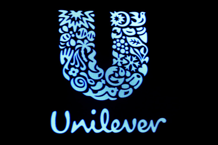 The company logo for Unilever is displayed on a screen on the floor of the NYSE