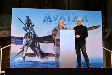 Director James Cameron (R), seen here at a January 12, 2023 Hollywood event with producer Jon Landau, now has three of the four all-time top grossing films: the original "Avatar," its new sequel and "Titanic"