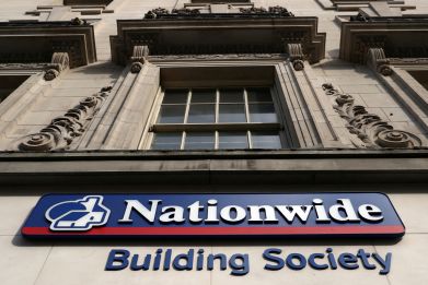 Signage is seen outside of a Nationwide Building Society in London