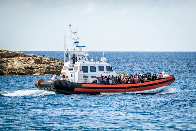 Italy recovers eight bodies from migrant boat | IBTimes UK