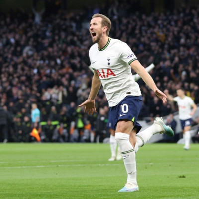 Tottenham striker Harry Kane celebrates after becoming his club's record goalscorer
