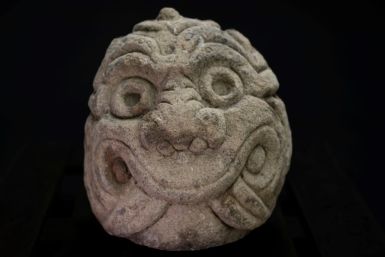 The massive Peruvian stone-carved head was sculpted some 2,500 years ago