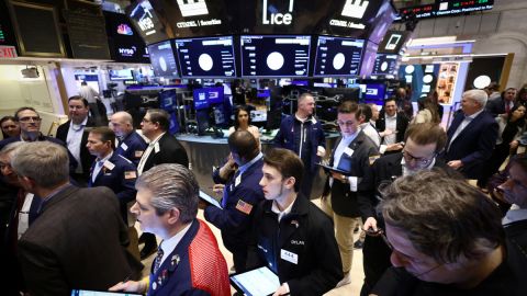 Traders work on the trading floor at the New York Stock Exchange (NYSE) in New York City