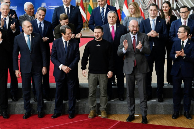 Amid the diplomatic bitterness, French leader  Macron tweeted a photo of the 27 EU leaders around Zelensky, writing: 'The European family'