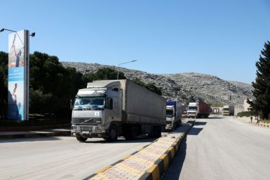 A United Nations aid convoy enters rebel-held northwestern Syria from Turkey through the Bab el-Hawa crossing