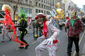 Supporters of WikiLeaks founder Julian Assange take part in a 'Night Carnival for Assange' march in London
