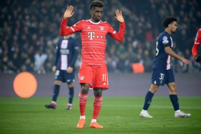 Kingsley Coman holds his hands up apologetically after putting Bayern ahead against his former club