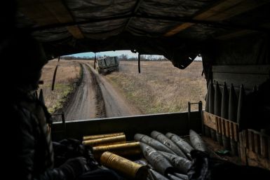 Ukrainian serviceman rides inside a truck with artillery shells near a frontline in Zaporizhzhia region