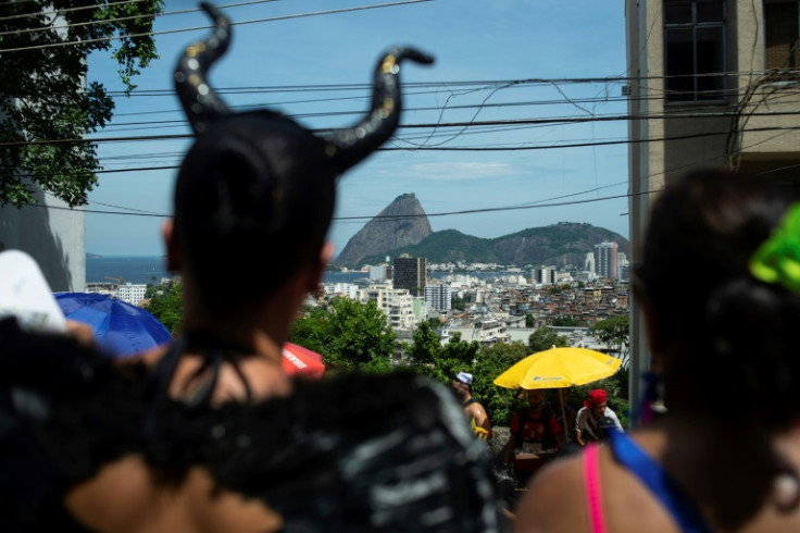 Revelers attend a street party in Rio de Janeiro on February 17, 2023