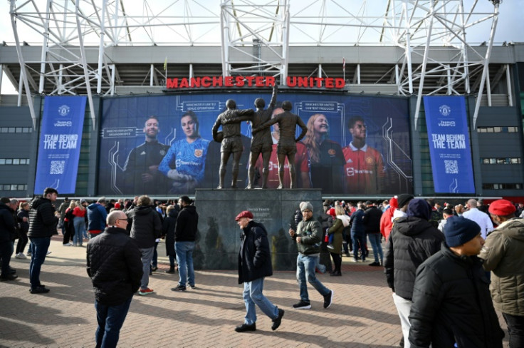 Fans arrive at Old Trafford ahead of Manchester United's match against Leicester amid uncertainty over the future owners of the club