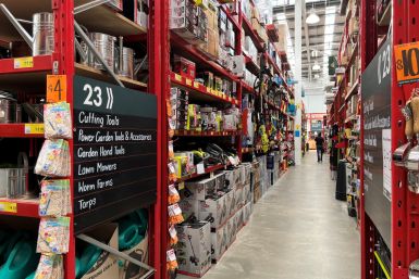 An employee of Bunnings walks down an aisle at a store in Sydney