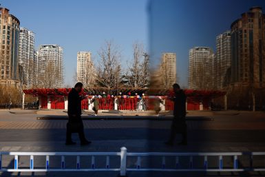Person walks on a street in Beijing