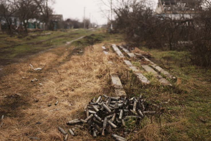 Tank ammunition is pictured on a street, which were used during the months of Russian occupation, amid Russia's invasion of Ukraine, in the village of Posad-Pokrovske