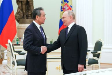 Vladimir Putin with Wang Yi