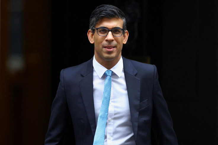 British PM Sunak looks on outside Number 10 Downing Street, in London