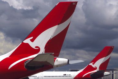 Two Qantas Airways Airbus A330 aircraft can be seen on the tarmac near the domestic terminal at Sydney Airport