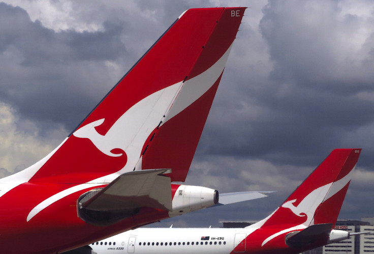 Two Qantas Airways Airbus A330 aircraft can be seen on the tarmac near the domestic terminal at Sydney Airport