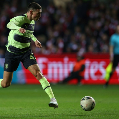 Manchester City's Phil Foden, who scored twice, runs at  the Bristol City defence