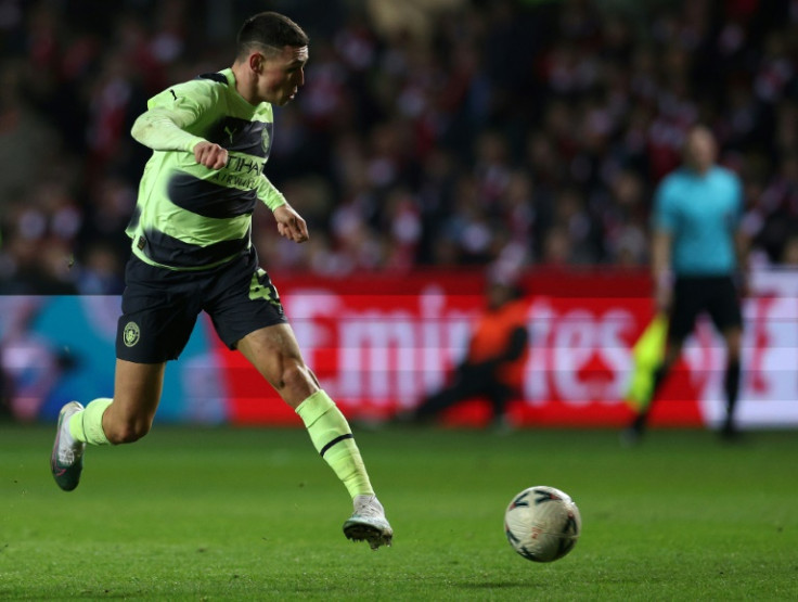 Manchester City's Phil Foden, who scored twice, runs at  the Bristol City defence