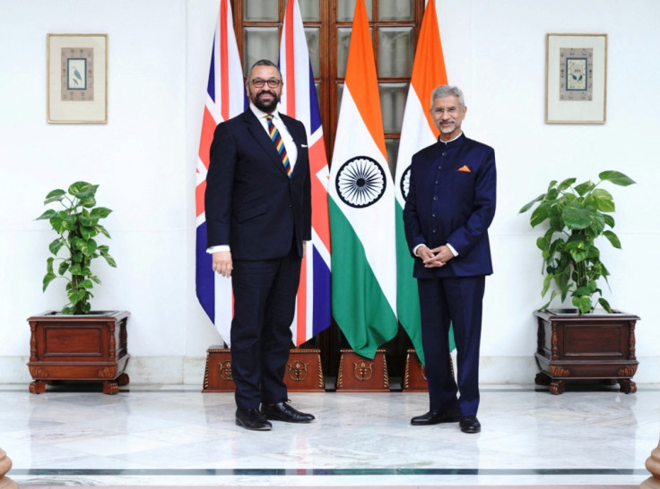 British Foreign Secretary James Cleverly and India's Foreign Minister Subrahmanyam Jaishankar pose for a photograph, in New Delhi