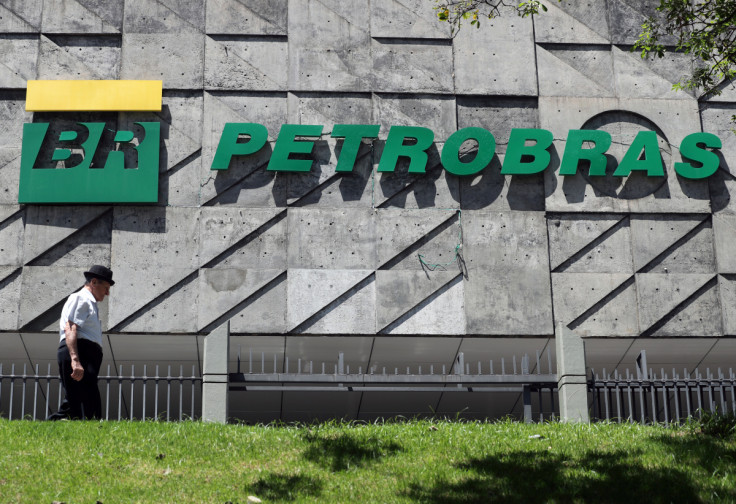 A man walks in front of the headquarters of Petroleo Brasileiro S.A. (Petrobas) in Rio de Janeiro