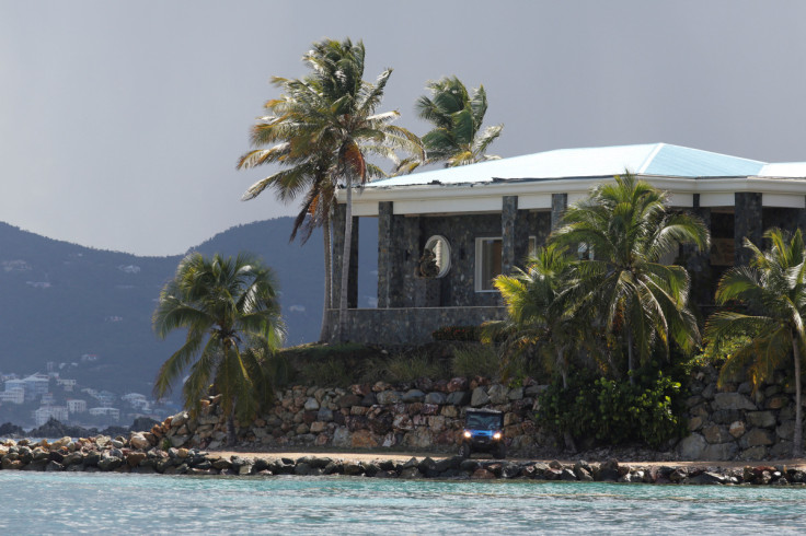 A man in a golf cart is seen at Little St. James Island, one of the properties of financier Jeffrey Epstein, near Charlotte Amalie