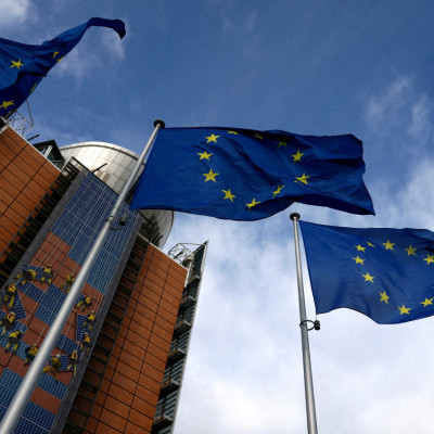 European Union flags flutter outside the EU Commission headquarters in Brussels, Belgium