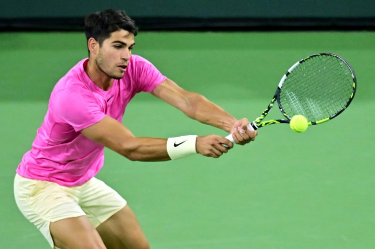 Top-seeded Carlos Alcaraz of Spain belts a backhand in his third-round victory over Tallon Griekspoor of the Netherlands at Indian Wells