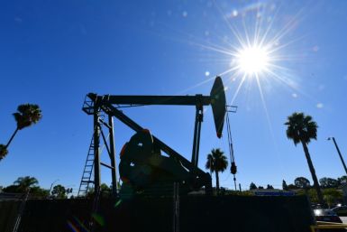 Oil prices were up Wednesday but remain under pressure over worries about a possible recession