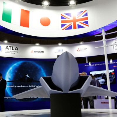 A concept model of the Global Combat Air Programme (GCAP)'s fighter jet is displayed at the DSEI Japan defense show at Makuhari Messe in Chiba