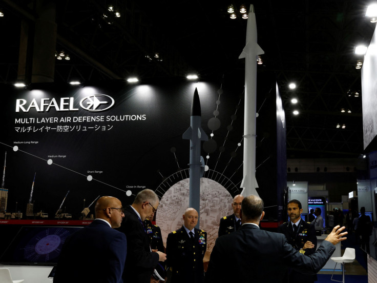 Italy's military officers visit the DSEI Japan defense show at Makuhari Messe in Chiba