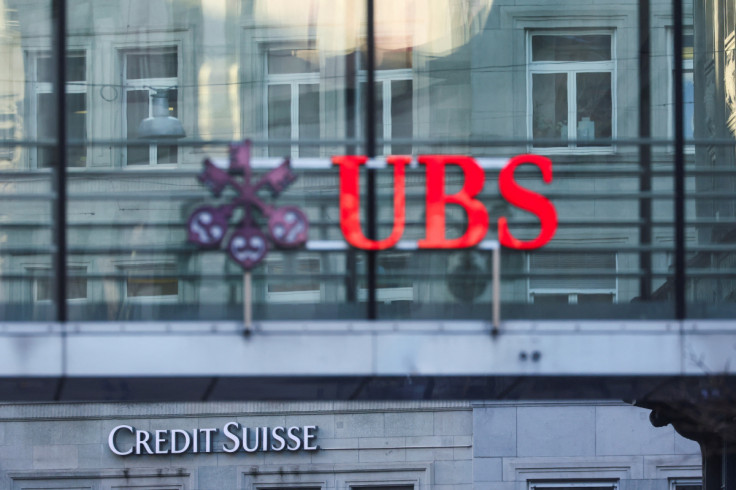 Logos of Swiss banks UBS and Credit Suisse are seen in Zurich